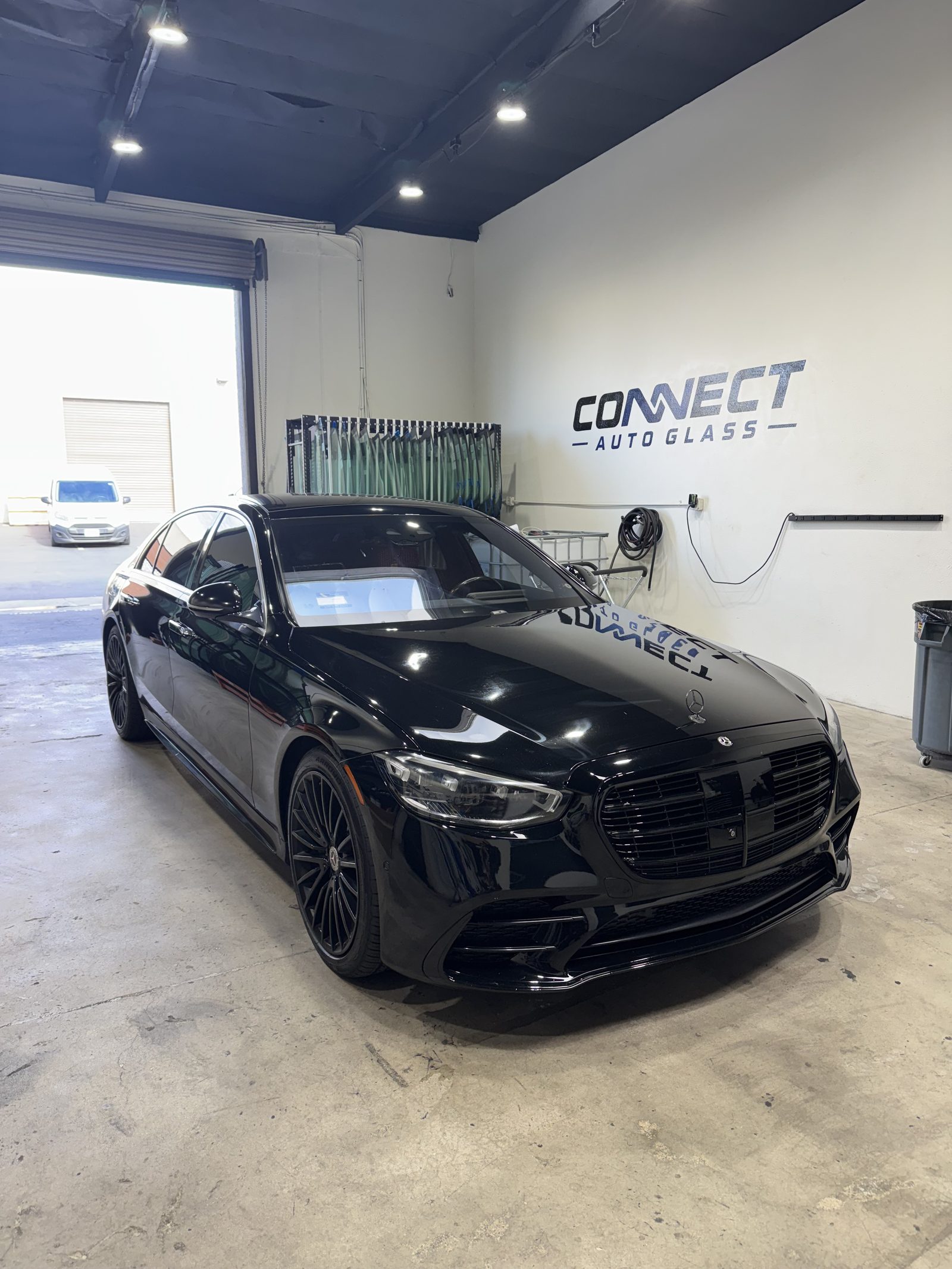 A Mercedes-Benz S-Class in the Connect Auto Glass shop in Miramar