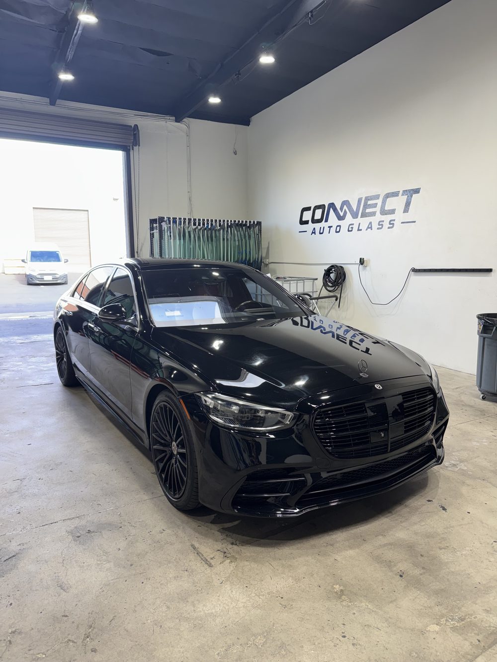 A Mercedes-Benz S-Class in the Connect Auto Glass shop in Miramar
